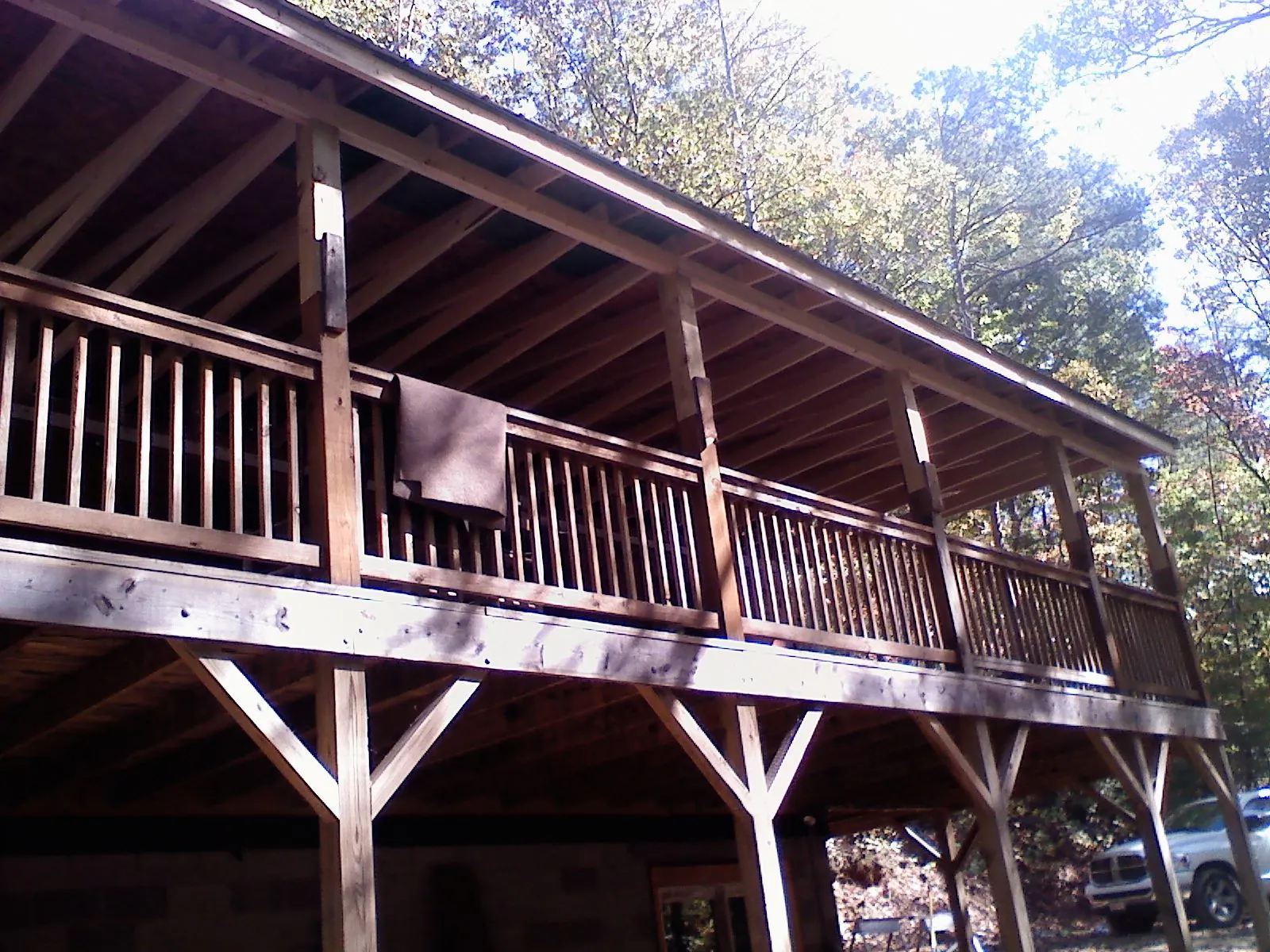 Timber framing under a new elevated porch and deck — Roof Leak Repair in Madras by Roofing Brothers